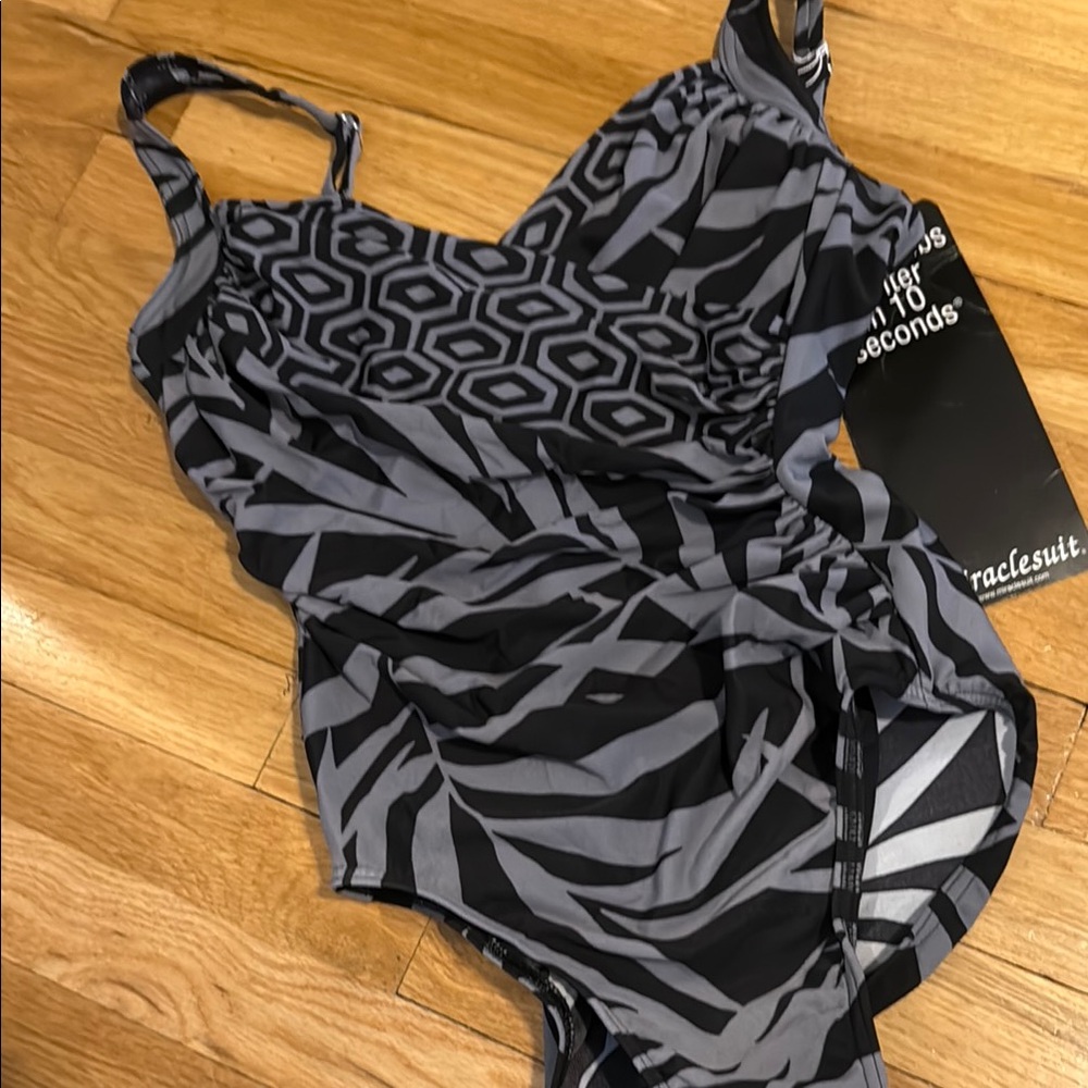 Stylish Gray Patterned adult One Piece
Miraclesuit size 10